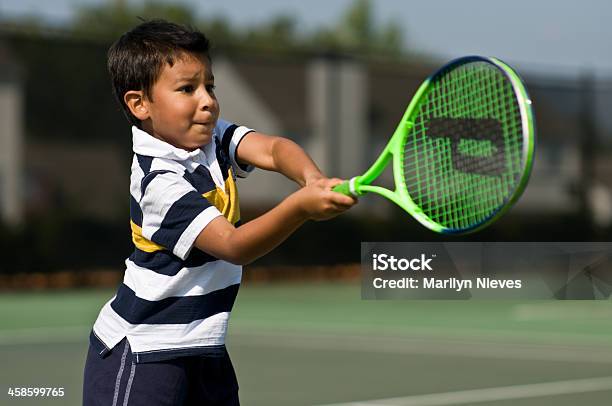 Intense Young Tennis Player Stock Photo - Download Image Now - Child, Tennis, Active Lifestyle