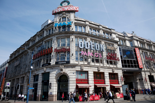 Manchester, UK - May 4, 2011: The Printworks building, Manchester. Originally a printing house, the building has been revived as an entertainment complex with bars, restaurants and cinemas.