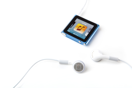 Portland, Oregon, USA - October 10, 2011: 6th Generation Apple iPod Nano with Multi-Touch technology. A portable mp3 player that is incredibly small with color touch screen.