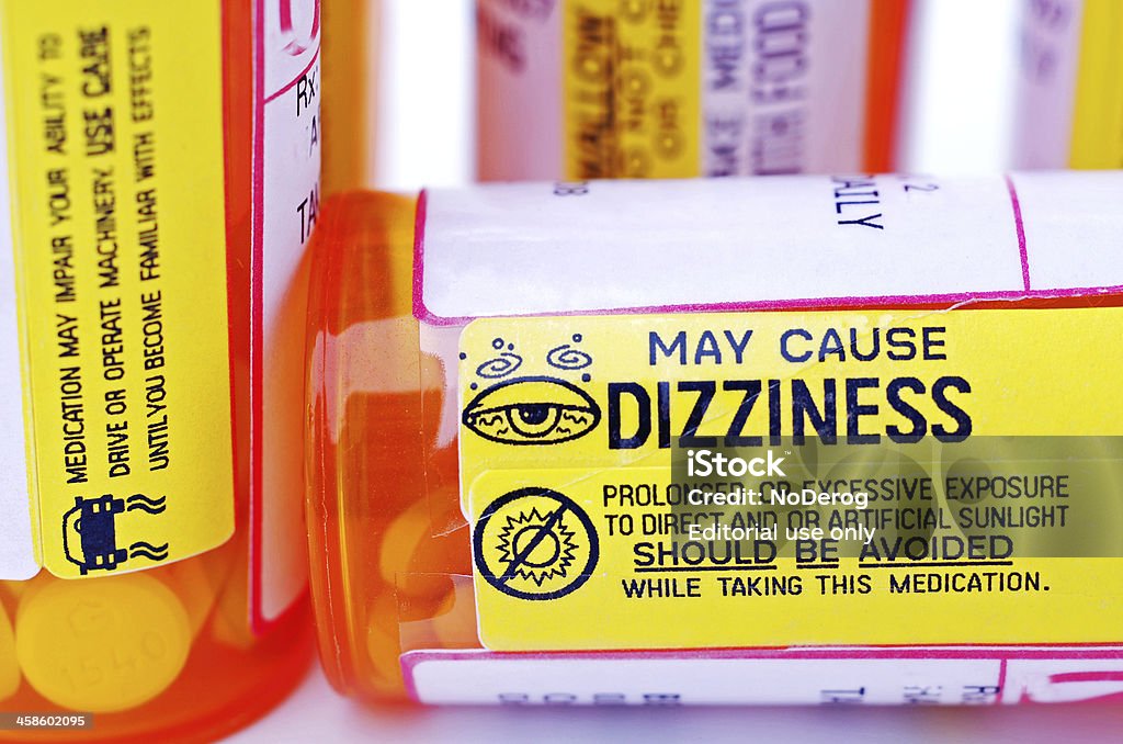 Prescrição de comprimidos e frascos com etiquetas de aviso de informação. - Royalty-free Efeito secundário de medicamento Foto de stock