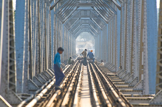 Mathura, India - Feb 04, 2009: The railway bridge on Yamuna River, Mathura, India. Mathura is a small city very close to Agra.
