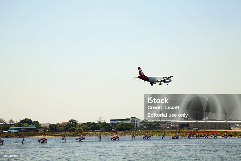 Airport RIO DE JANEIRO, BRAZIL - October 8, 2011: TAM's Airplane landing at Rio de Janeiro International Airport Tom Jobim - Galeao. Airplane Stock Photo