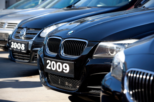 Antalya, Turkey - October 28th, 2011: Local second hand car dealership. Focus on 2009 model BMW automobile. BMW (Bavarian Motor Works), German automobile, motorcycle and engine manufacturing company is famous with luxury cars. The cars on photo are for sale and for rent.