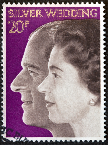 Denny, Scotland - January 13, 2010: A 1972 stamp depicting Queen Elizabeth II and Prince Philip.  Stamp first released 20th November 1972
