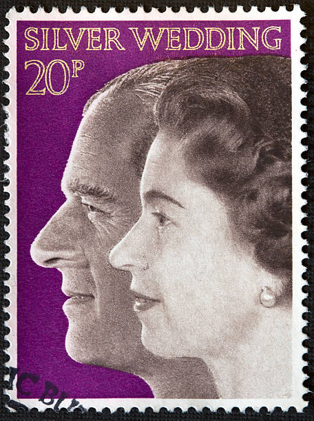 Silver Wedding Stamp circa 1972 Denny, Scotland - January 13, 2010: A 1972 stamp depicting Queen Elizabeth II and Prince Philip.  Stamp first released 20th November 1972 prince phillip stock pictures, royalty-free photos & images