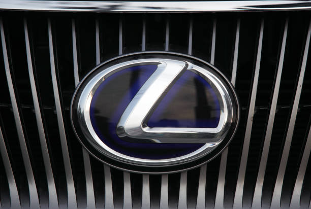 Lexus logo on a new RX450h car grille stock photo