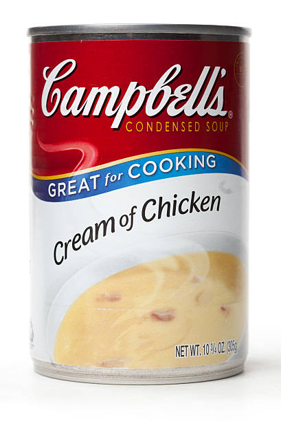 Campbell's Condensed Cream of Chicken Soup Belen, New Mexico, USA - April 27, 2012: A can of Campbell's Condensed Cream of Chicken Soup on a white background. Campbell Soup Company is a global manufacturer and marketer of high-quality foods and simple meals. cream soup stock pictures, royalty-free photos & images