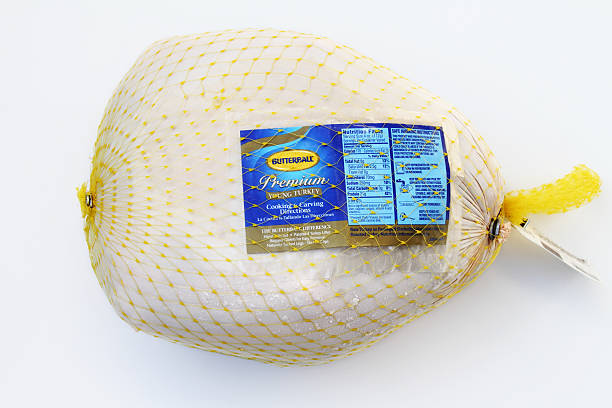 Butterball Turkey West Palm Beach, USA - November 16, 2011: This is a studio product shot of a frozen Butterball turkey. Thousands of American families cook Butterball turkeys for their Thanksgiving dinner. green winged teal duck stock pictures, royalty-free photos & images
