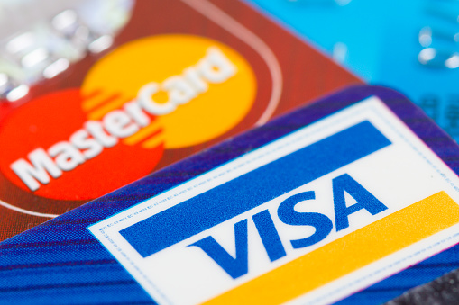 Moscowl, Russia - July 28, 2011: Two credit cards macro - Visa and MasterCard (out of focus).