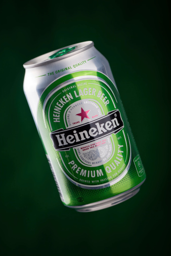 Sofia, Bulgaria - February 26, 2011: Heineken beer Premium Quality, studio shot on green background,