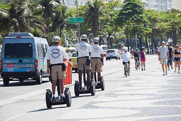 guarda municipal riding segways en rio de janeiro - segway security staff security security guard fotografías e imágenes de stock