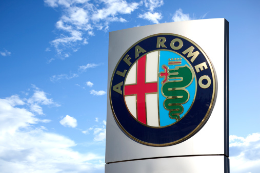Antalya, Turkey - October 28th, 2011: The roadside sign of Alfa Romeo local dealership building. Italian automobile manufacturer Alfa Romeo founded in 1910, in Milan. The company is part of Fiat Group since 1986. Alfa Romeo is popular with sport and luxury cars.