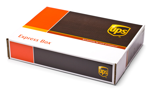 San Marcos, California - May 12, 2011: Clipping Path - UPS Box. UPS is a package delivery company. They are located in Sandy Springs, Georgia in the United States. They offer the following services: U.S. Domestic Package, International Package and Supply Chain and Freight. Revenue for 2010 was $49 billion.