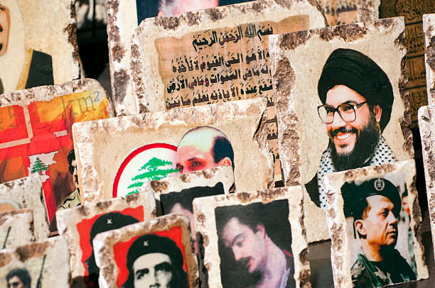 Byblos, Lebanon - September 4, 2010: Images of famous political figures on stone are for sale on the streets of the old city of Byblos. Most prominent here is Hassan Nasrallah (right), Secretary General of the Lebanese political and paramilitary organization Hezbollah.