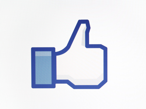 Istanbul, Turkey - October 14, 2011: A close-up view to the Facebook like button on LCD screen. This form is the most widely known among similar.