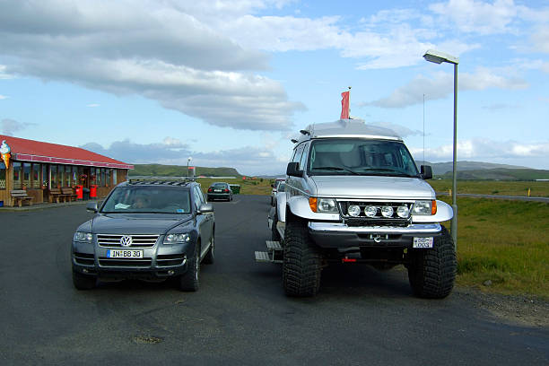 Skaftafell, Iceland - August 17, 2008: A VW Touareg and an icelandic monster-truck with 44" tires at the ring road of Iceland.
