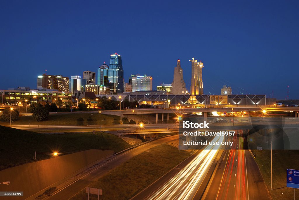 Kansas City skyline and freeway at dusk Kansas City, United States - October 25, 2008: Kansas City Downtown Skyline with Interstate 670 and the I-670 / I-35  Interchange in the foreground, at dusk, wide angle view.  Kansas city is the most populous city in Missouri and the second most populous metropolitan area in Missouri.  Kansas City lies on the Missouri - Kansas border, just right across Kansas City, Kansas. Kansas City - Missouri Stock Photo