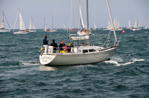 Hyannis, Massachusetts, USA-May 26, 2012: Sailing yachts of all sizes move into position at the start of the annual Hyannis to Nantucket Figawi race  on Cape Cod.