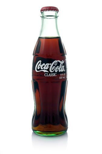 Los Angeles, USA - May 1, 2011: A Coca-Cola glass bottle on a white isolated background.