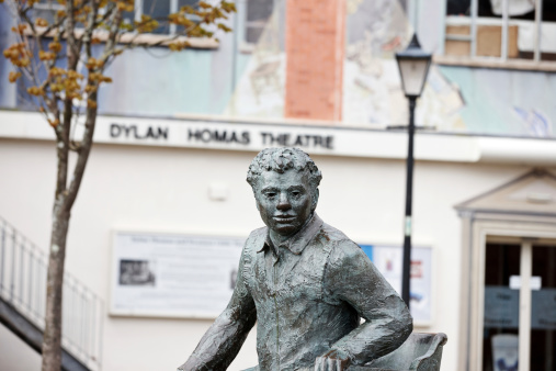 Swansea, Wales - April 15, 2011: Dylan Thomas statue outside the Dylan Thomas Theatre in Swansea Marina