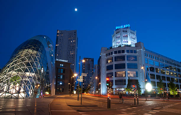 Eindhoven, the Netherlands - May 12, 2011: Long exposure capture of Eindhoven city center and famous \\'Witte Dame\\' building on the right-hand side during blue hour. Eindhoven is one of the biggest cities in the Netherlands, famous with its technology companies such as Philips and ASML and also modern architecture. It\\'s also called \\\