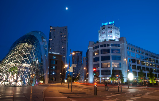 Eindhoven, the Netherlands - May 12, 2011: Long exposure capture of Eindhoven city center and famous \'Witte Dame\' building on the right-hand side during blue hour. Eindhoven is one of the biggest cities in the Netherlands, famous with its technology companies such as Philips and ASML and also modern architecture. It\'s also called \