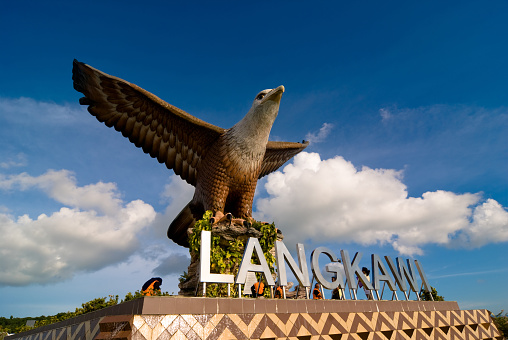 Langkawi, Malaysia - July 1, 2009: Dataran Lang (Eagle Square) has a huge sculpture of an eagle poised for flight, is the tourist landmark of Langkawi. Eagle is also the mascot of Langkawi.