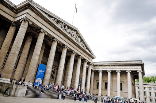 London, United Kingdom - August 6, 2011: Entrance to the British Museum, the 2nd most visited museum in the world only behind the Louvre in Paris, France. The museum\'s collections number over seven million pieces.
