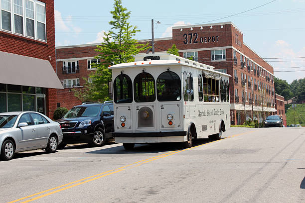 Asheville, NC, USA - June 11, 2011: A trolley company in Asheville runs historical tours for tourists.Some tours focus on where ghostly activities have taken place.