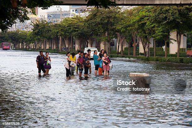 Thailand Floods People Waiting For Transportation Stock Photo - Download Image Now