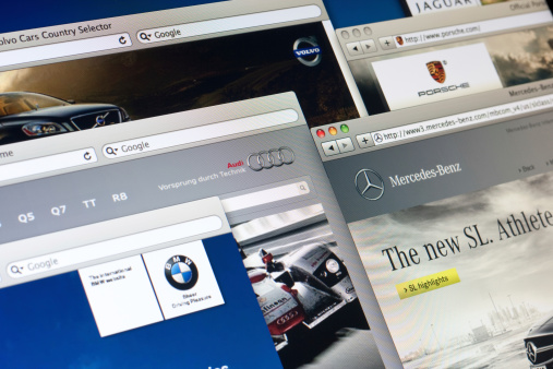 Belgrade, Serbia - December 23, 2011: View over main luxury and sports auto manufacturers websites on the laptop screen. Included manufacturers are Mercedes-Benz, Audi, BMW, Volvo and Porsche