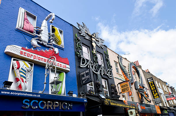 Quirky shop fronts on Camden High Street, London London, United Kingdom - July 24, 2011: Decorative, quirky shop fronts on Camden High Street. Camden Town is known as a bohemian area and is famous for it's alternative culture shops, markets, bars and music venues. Camden High Street and the nearby markets are one of London's most popular tourist destinations, attracting approximately 100,000 visitors every weekend. camden market stock pictures, royalty-free photos & images