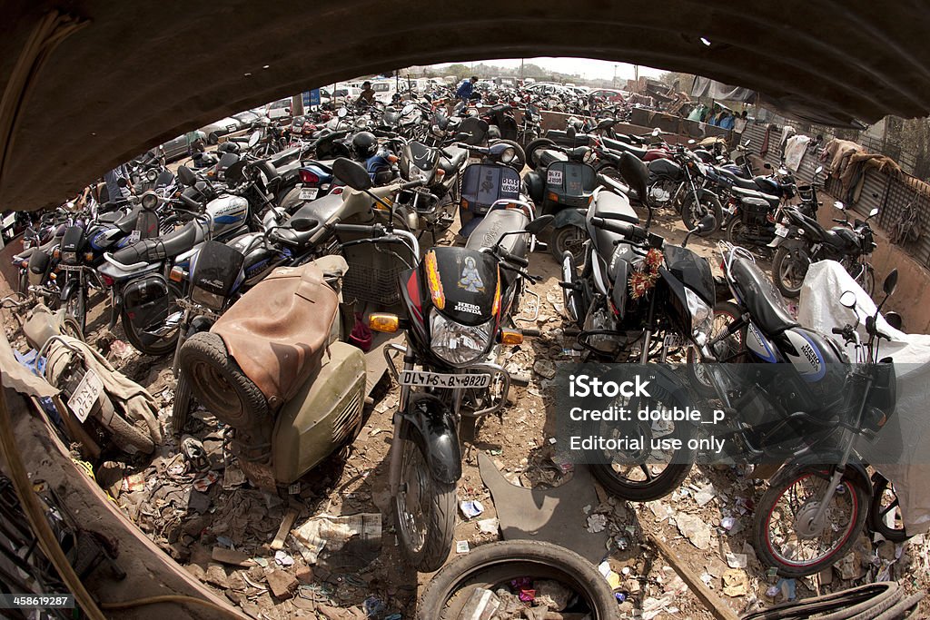 motorcycle junk yard Old Delhi. India - March  3, 2010: Fish Eye view of a motorcycle junkyard in the Old part of New Delhi, India Fish-Eye Lens Stock Photo