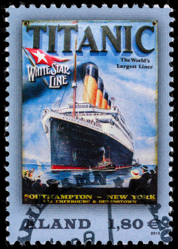 Sacramento, California, USA - June 8, 2012: A 2012 Aland postage stamp with a reproduction of one of the original posters used by White Star Line to advertise the Titanic's maiden voyage from Southampton, UK to New York, USA in April, 1912.