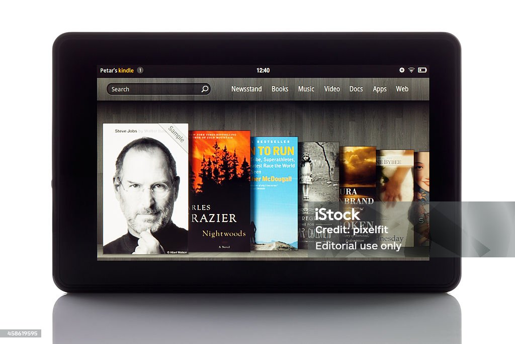 Amazon Kindle Fire et des tracés de détourage - Photo de Steve Jobs libre de droits