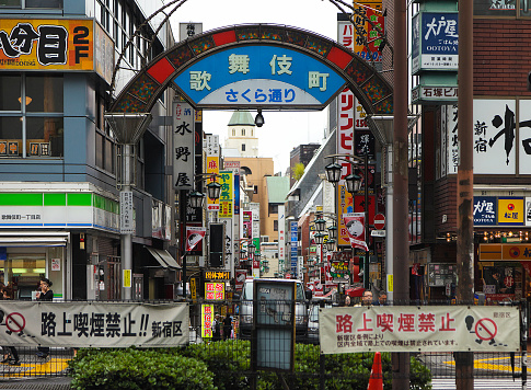 Tokyo, Japan - May 30, 2011: The entrance to the Kabukicho area of the Shinjuku district in Tokyo. Kabukicho is the location of many hostess bars, host bars, love hotels, shops, restaurants, and nightclubs.