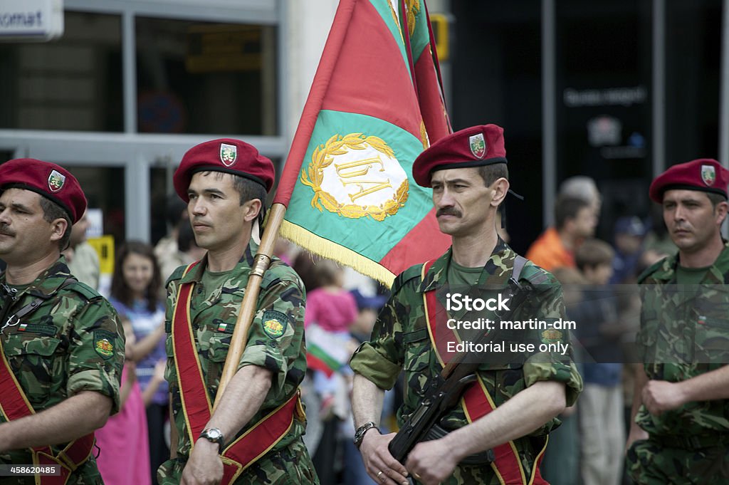 Military parade Sofia,Bulgaria - May 6, 2010:  Guards officers dressed in a traditional clothing performing military parade and marching with a flag on Tsar Osvoboditel Boulevard,which is one of the main boulevards in Sofia. The event is celebrating the Day of the Bulgarian army,which is an official holiday every year. Bulgaria Stock Photo