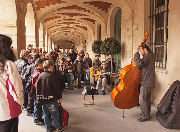 School Children Listening to Music in Paris stock photo