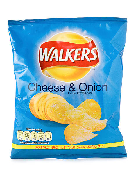 Walkers cheese and onion crisps on a white background St Ives, England - August 15, 2011: A 25g bag of Walkers Cheese and Onion crisps from a multi-pack isolated on a white background. Walkers is a British snack food manufacturer owned by Frito-Lay, a subsidiary of PepsiCo. lays potato chips stock pictures, royalty-free photos & images