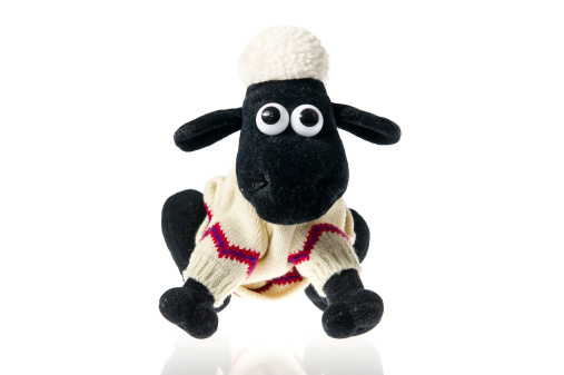 Shrewsbury, Shropshire, UK - February 10th 2012. Product shot of a soft toy of the character Shaun the Sheep who made his first \\\
