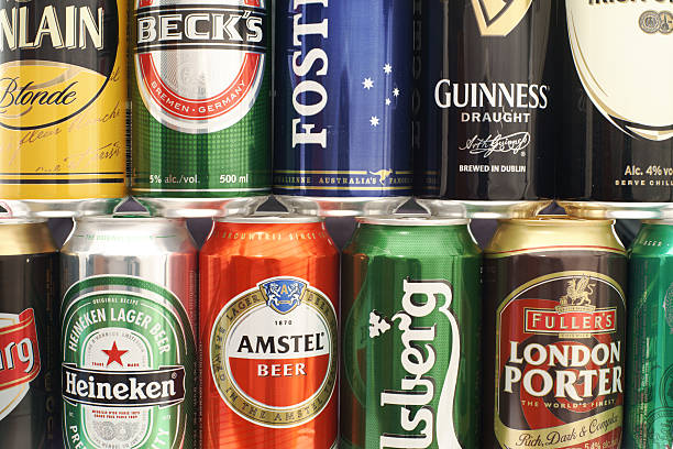 Celje, Slovenia - March 13, 2011: Different half liter cans of beer as wallpaper. Walpaper is created from well known beers like: Heineken, Fosters, Amstel, Carlsberg, Guinness, Beck's and others.