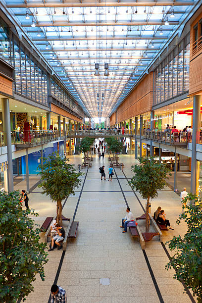 Berlin, Germany - August 22, 2011: High angle view of the Potsdamer Platz Arkaden (shopping mall) in Berlin, Germany. The shopping mal was built by italian architect Renzo Piano which opened in 2001.