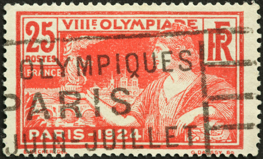 Boulder, USA - April 9, 2012:1924 French postage stamp commemorating the Paris Summer Olympics of the same year.  It was know as the Games of the VIIIth Olympiad. 44 Nations participated.  The image is a woman in flowing robes with the Olympic Torch.