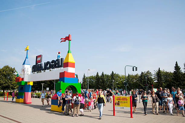 Legoland Billund, Denmark - August, 02th 2011: The Legoland entrance in Billund, Denmark. People are walking towards to get in. billund stock pictures, royalty-free photos & images