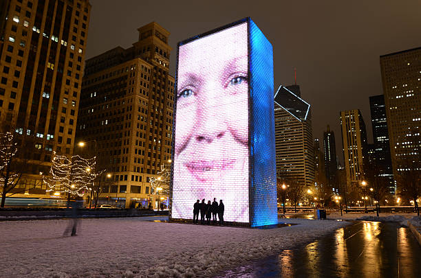Chicago, Illinois, USA - December 24, 2010: Night shot of the Crown Fountain, by the artist Jaume Plensa at the Millennium Park in Chicago, IL. This is always an attraction for tourist, even during the winter days.