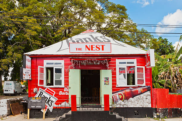 Bridgetown, Barbados - November 20, 2011: colorful kiosk made in red corrugated iron selling beer on the streets of Bridgetown.