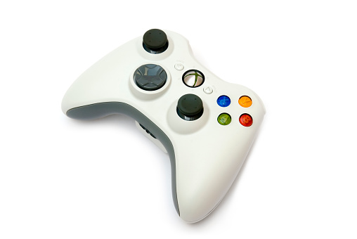Mexico City, Mexico - March 25, 2007: Wireless Xbox 360 white controller. It was launched in May 2005, and was in production until the year 2010 when a new redesigned black console was launched.