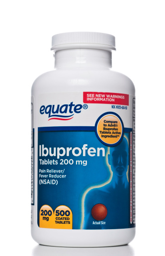 Miami, USA - February 05, 2012: Equate Ibuprofen 200 mg pills bottle. Equate is part of Walmart\'s private label store brands for consumable pharmacy and health items.