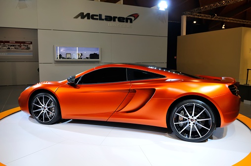 Brussels, Belgium - January 10, 2012: Orange McLaren MP4-12C Bespoke Edition on display during the 2012 Brussels motor show.