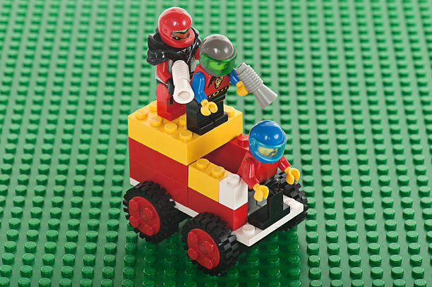 Albuquerque, USA - December 5, 2011: Studio shot. Lego, consists of colorful interlocking plastic bricks and an accompanying array of gears, minifigures and various other parts. Lego bricks can be assembled and connected in many ways, to construct such objects as vehicles, buildings, and even working robots. Anything constructed can then be taken apart again, and the pieces used to make other objects. The toys were originally designed in the 1940s in Denmark and have achieved an international appeal.